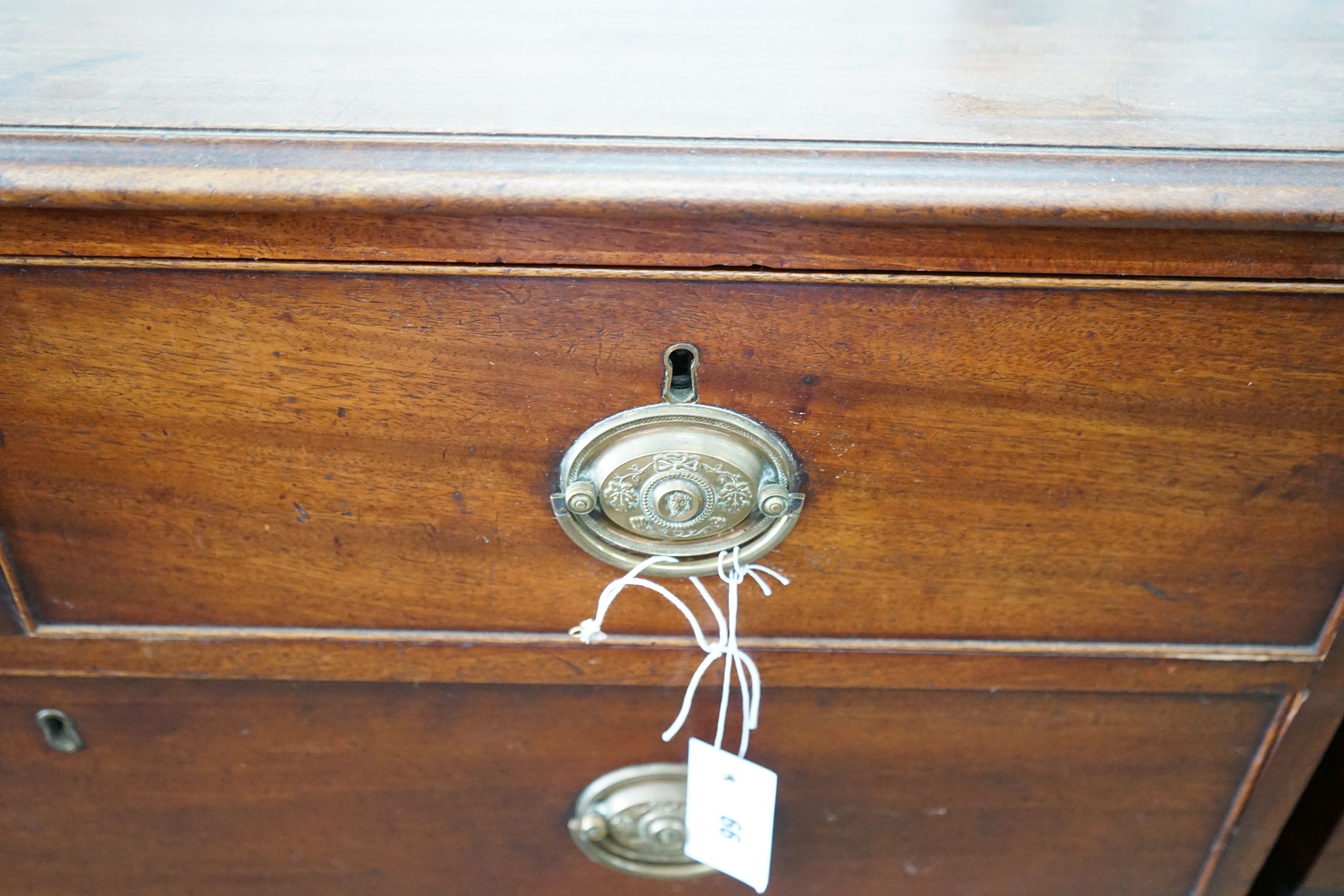 A George III mahogany straight front chest, fitted three long drawers and two short drawers, width 102cm, depth 49cm, height 102cm